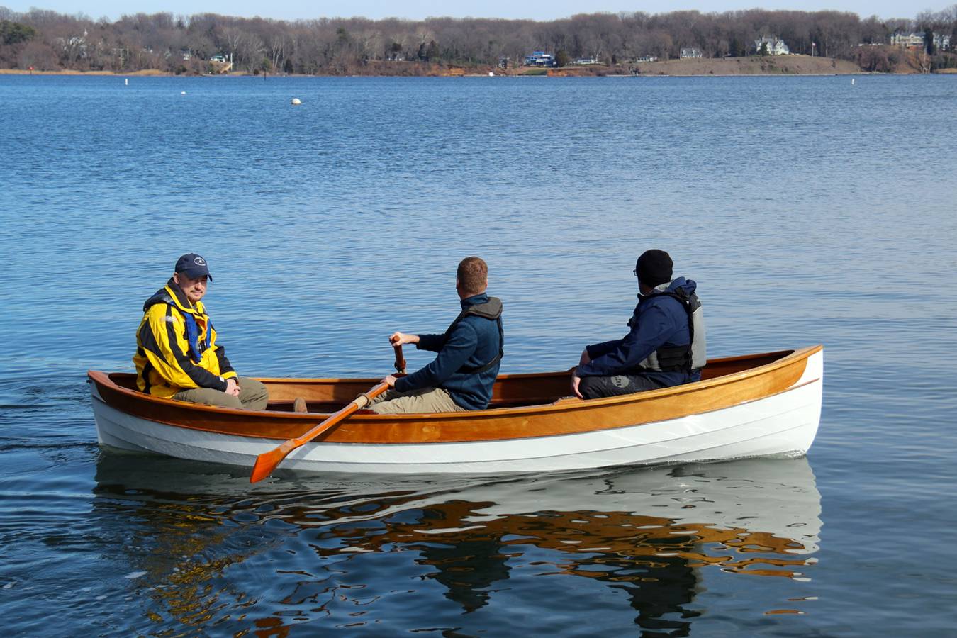 A modern wooden rowing boat based on a traditional Maine Peapod
