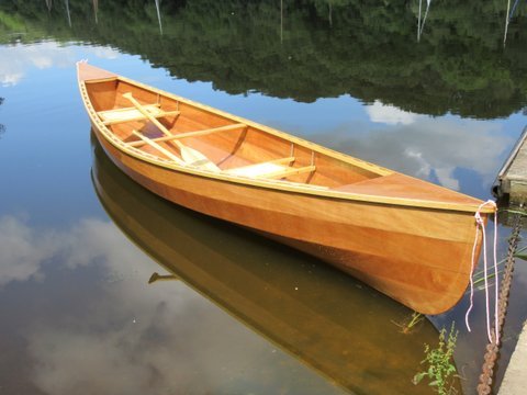 A lightweight wooden Canadian canoe built from a kit