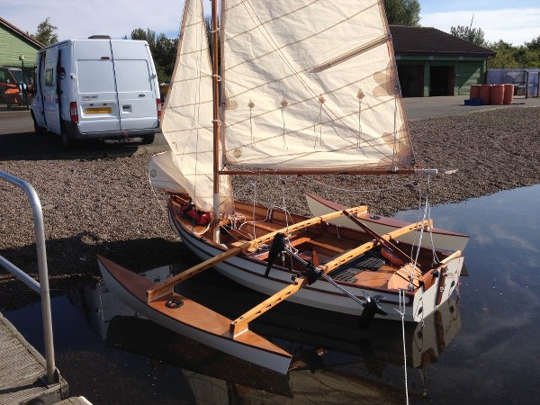 Fyne Four sailing dinghy with Michael Storer outriggers