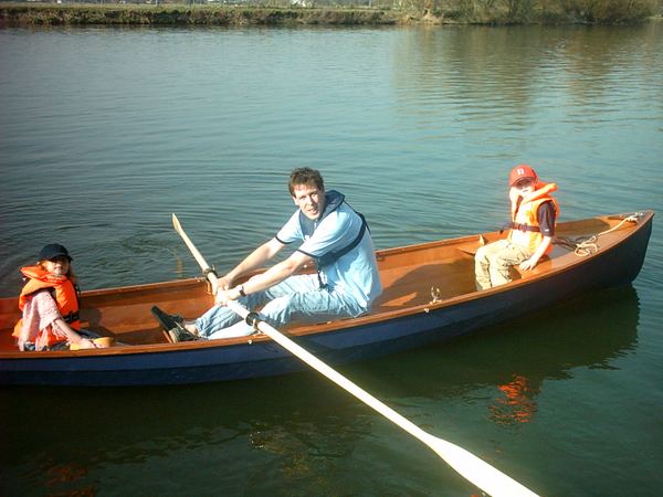 Family adventure in a rowing boat built in the garage