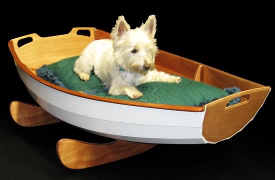 Cradle boat as a bed for a small dog