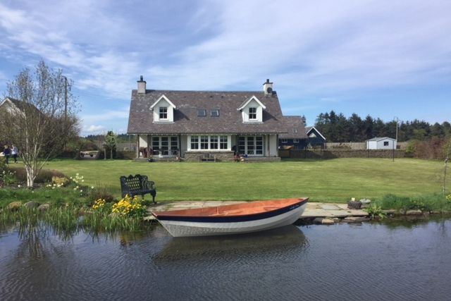 The Dinky Dory is a clinker-style wooden rowing boat