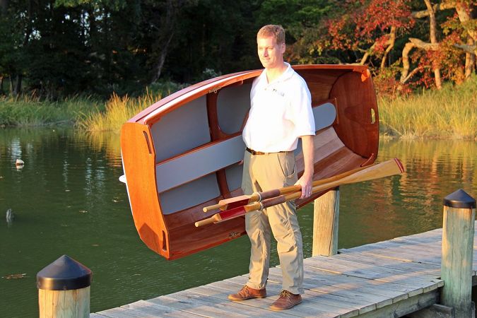 Carrying the Eastport Ultralight Dinghy using the bench seat as a handle