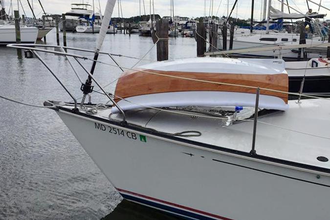 Ultralight tender designed to fit on the foredeck of a small yacht