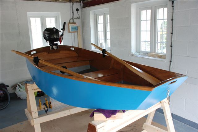 Puting the finishing touches to a home made diy motor boat
