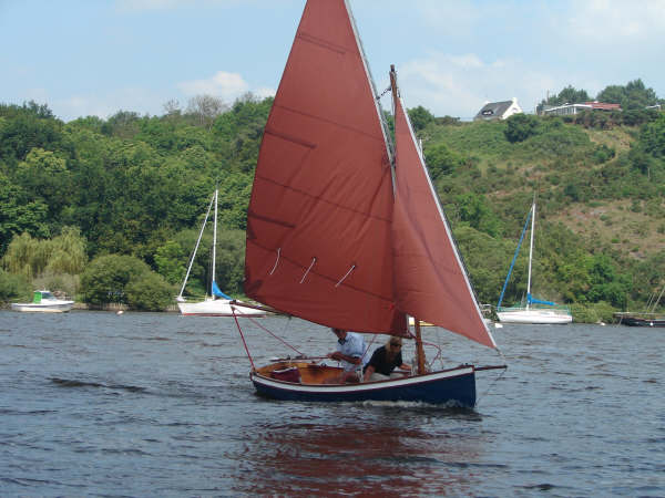 Clinker sailing dinghy with bowsprit built from a Fyne boat kit