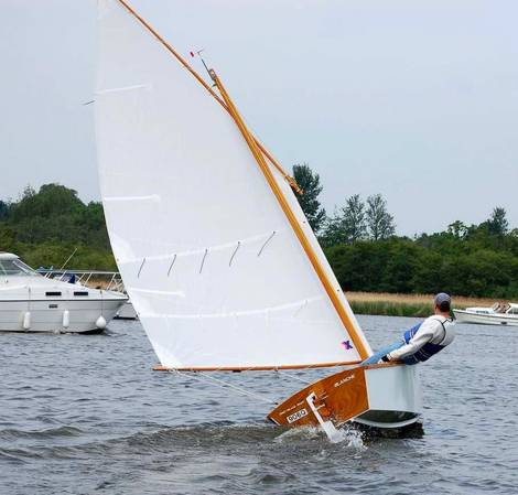 The Goat Island Skiff is a simple lightweight wooden sailing dinghy