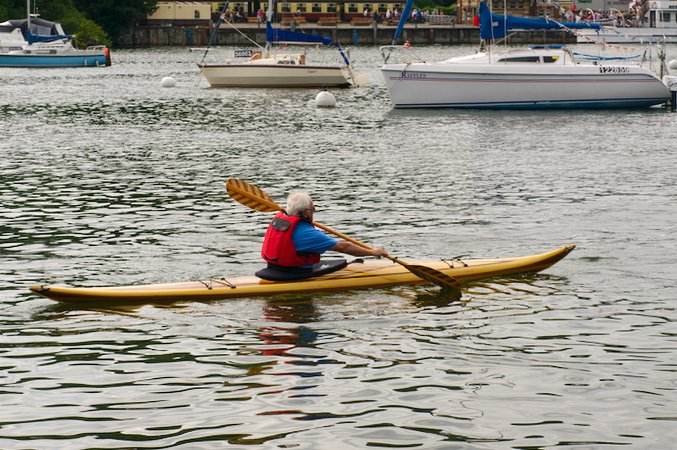  an efficient and responsive cedar-strip sea kayak for smaller paddlers