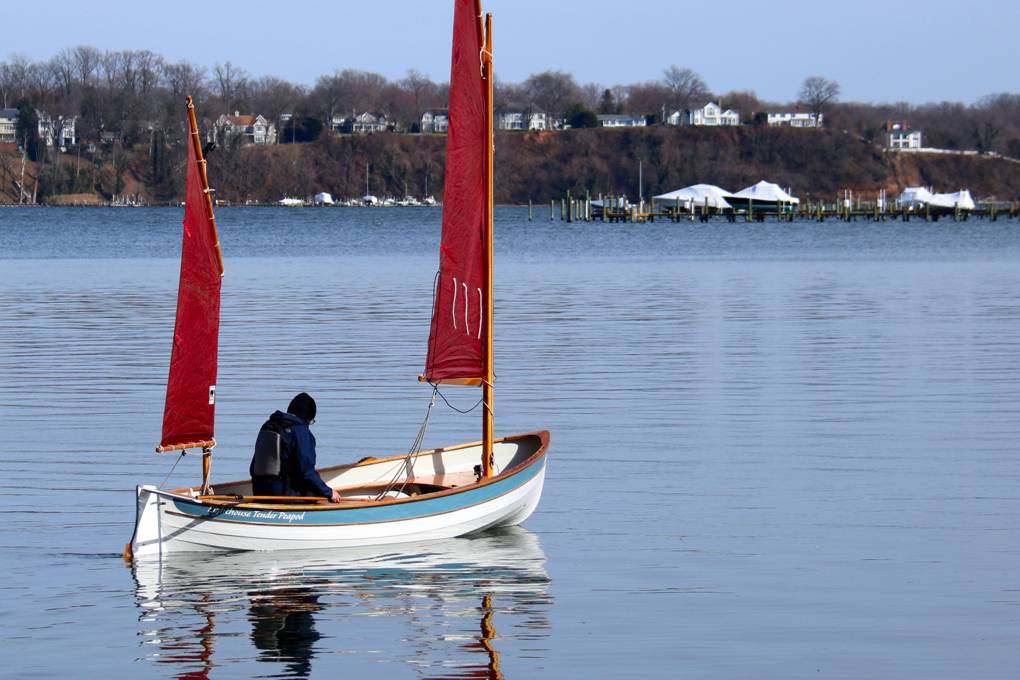 A stable but fast double-ended rowing or sailing boat based on a traditional Maine Peapod