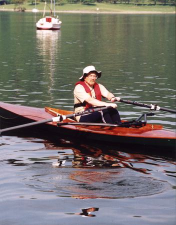 Row a canoe with a sliding seat