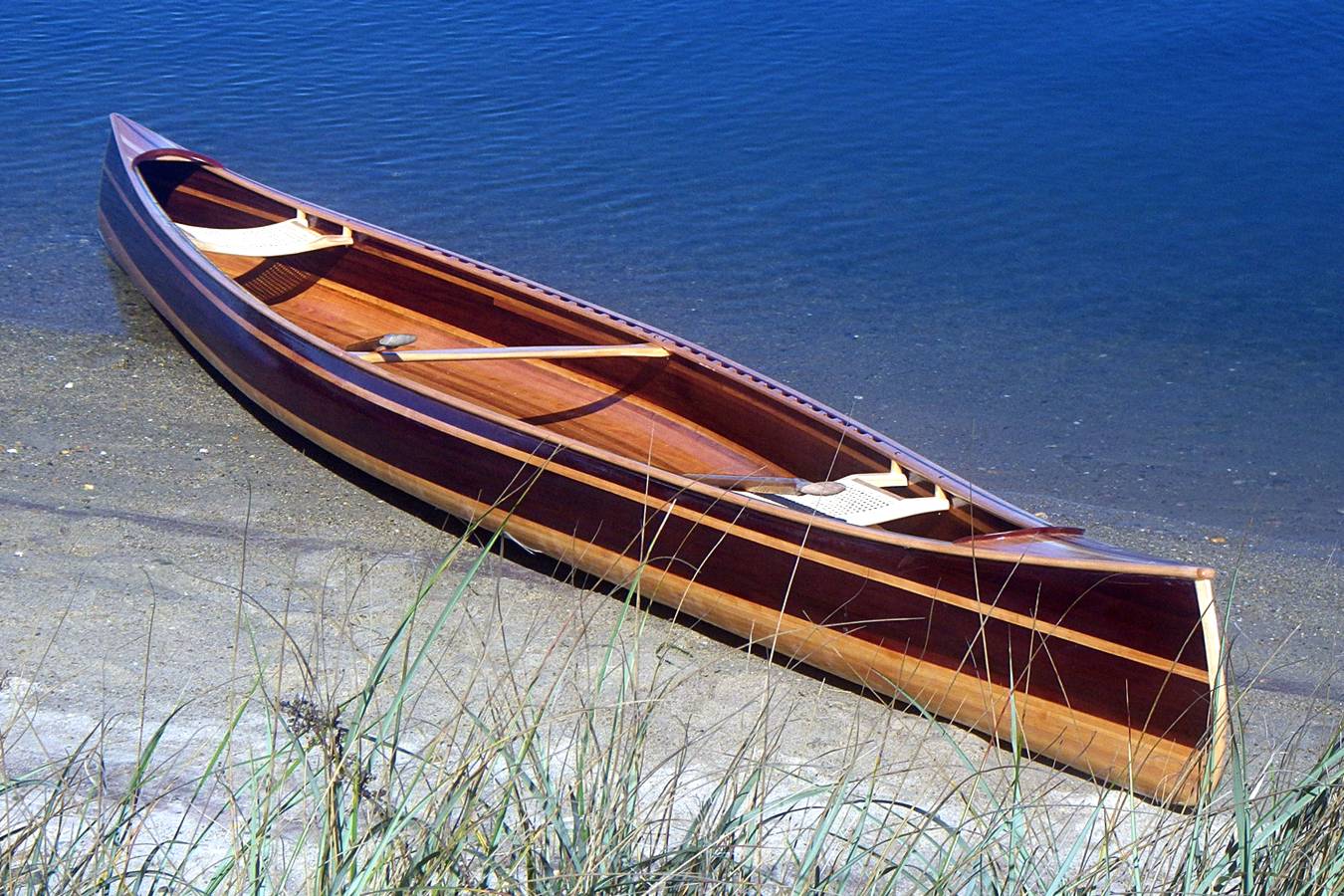 The Mystic River tandem canoe on a beach
