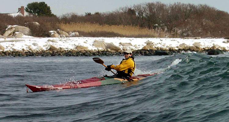 Surfing a Night Heron stitch-and-glue sea kayak