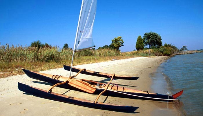 A kayak fitted with outriggers