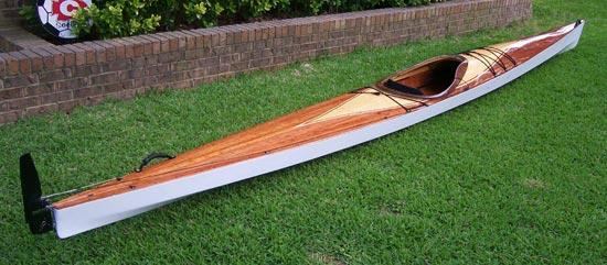 A cedar-strip decked Pax 20 wooden kayak