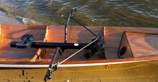 Sliding seat rowing unit