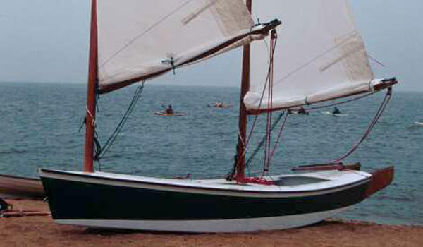The 18 foot Sharpie sailing boat is easily beached, thanks to the retractable daggerboard