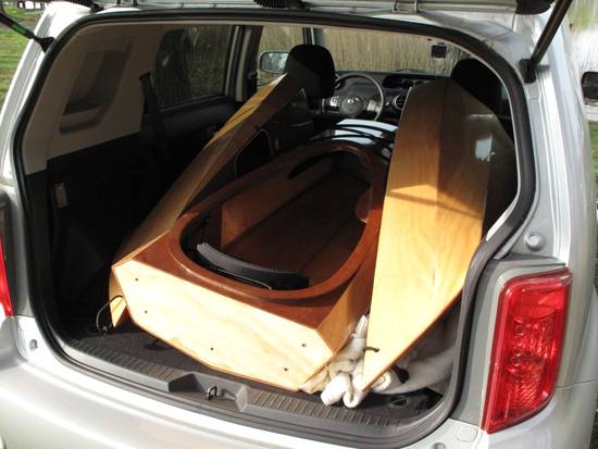 The sectional Shearwater Sport kayak fits in a car