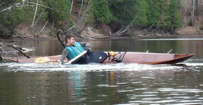 Steering a wooden kayak