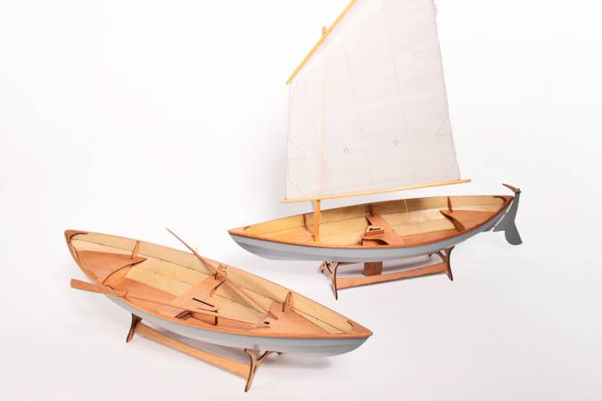 A scale model of the Skerry, rowing and sailing versions compared