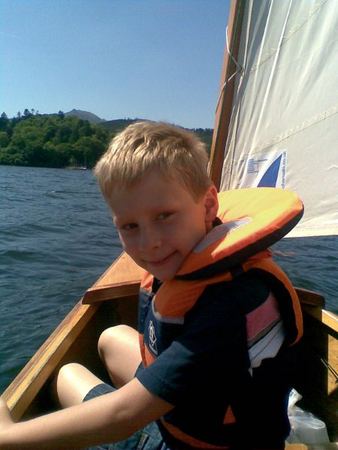 Fun of sailing the skiff after the boys had built it