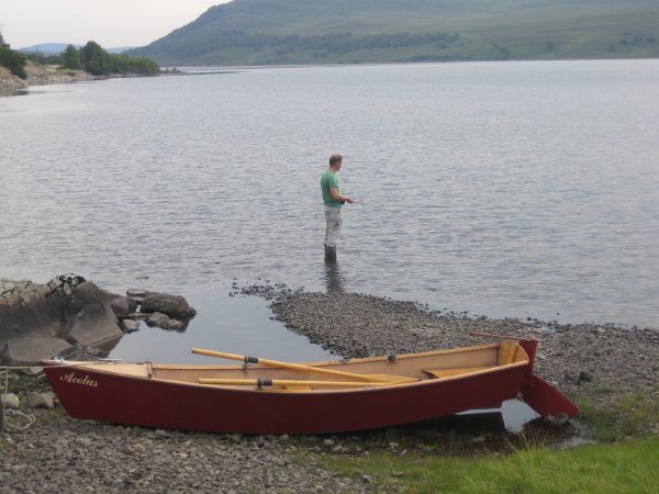 Fishing in a secluded beauty spot from a home made boat