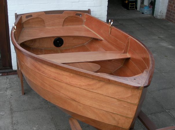 Professional Epoxy Coatings on a stem dinghy before it is varnished