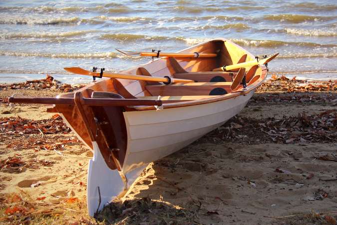 Team Dory wooden racing boat for four rowers