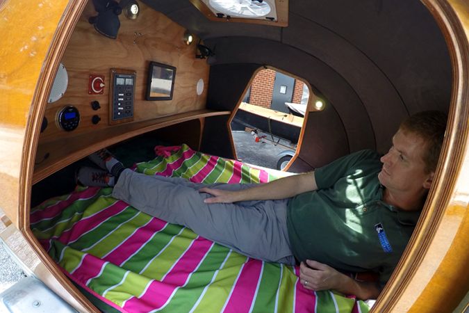 The spacious interior of the stitch-and-glue teardrop camper comfortably fits two adults