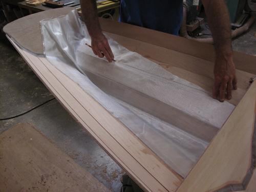 Wetting out fabric with professional epoxy coatings when building a stitch and glue rowing boat