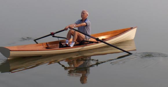 Rowing a wherry in calm water
