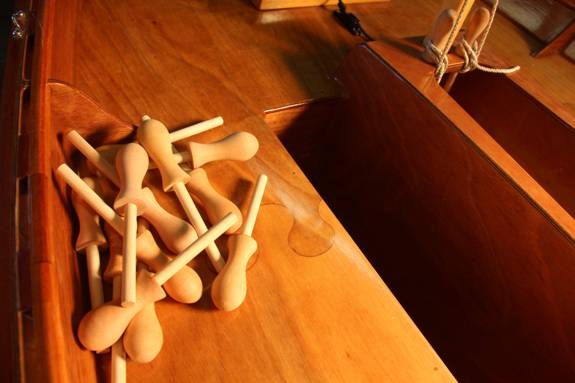 Traditional wooden belaying pins for sailing boats