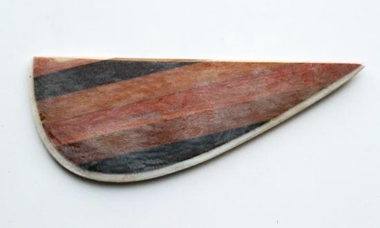 Laminated wooden fin for a paddleboard