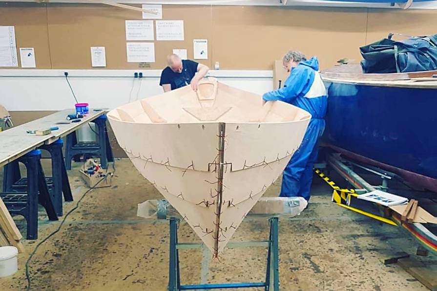 Ian and Kieran building the Northeaster Dory