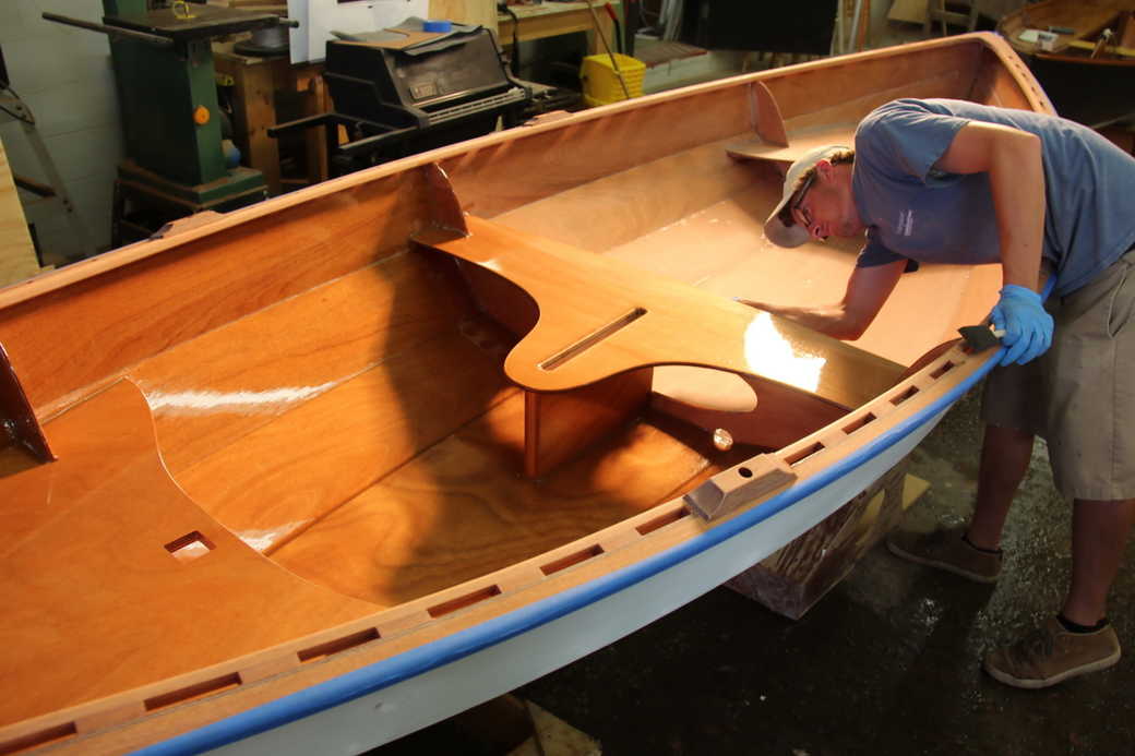 Varnishing the interior of the hull
