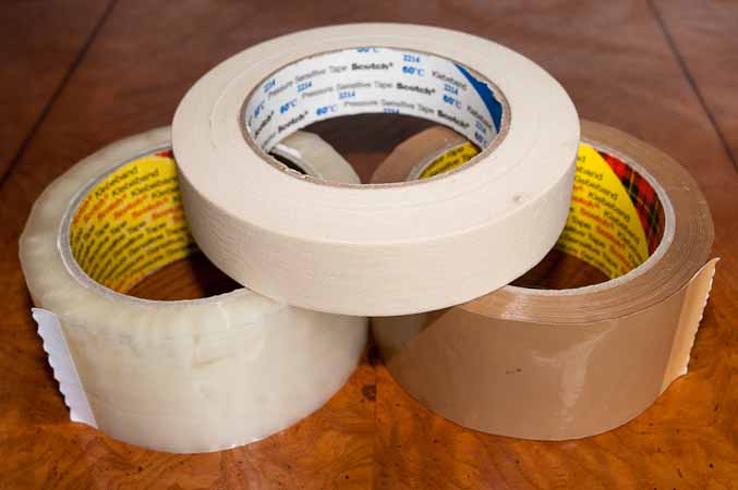 Adhesive masking and packing tape for painting straight lines and preventing the spread of epoxy