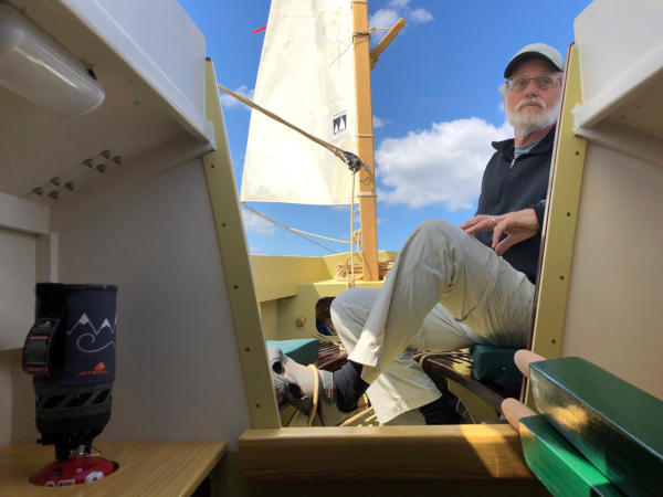 Autumn Leaves wooden canoe yawl designed for engineless coastal cruising by sail and oars