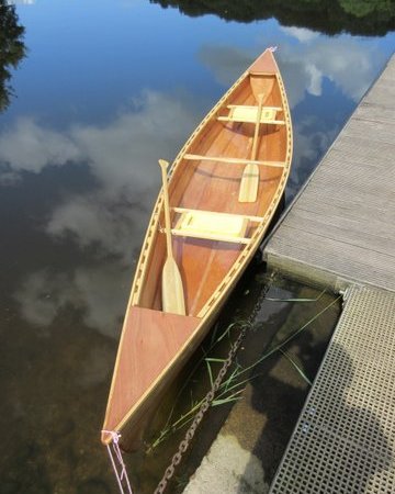 A lightweight wooden Canadian canoe built from a kit