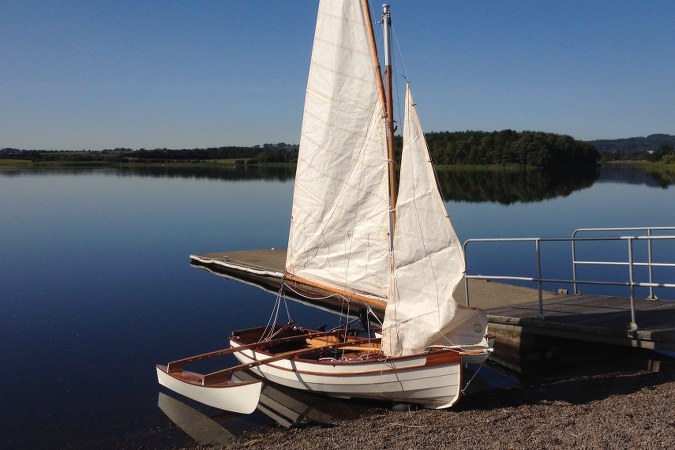 Fyne Four sailing dinghy with Michael Storer outriggers