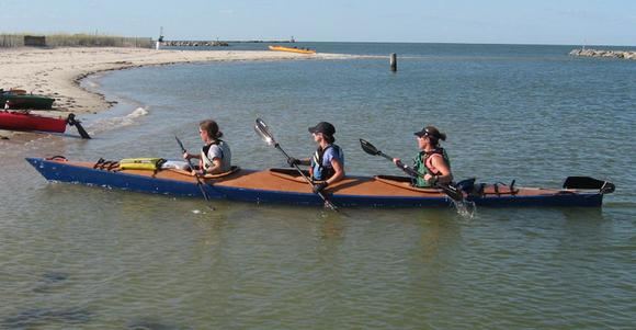 Wooden triple kayak built from a kit