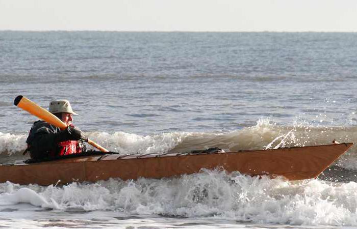 Surfing in a kayak