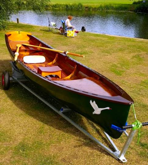 The Chester Yawl is a clinker-style wooden rowing boat with high freeboard