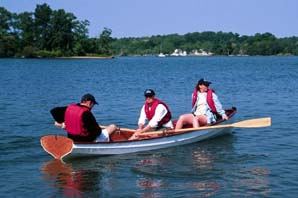 Three in a home built clinker rowing yawl