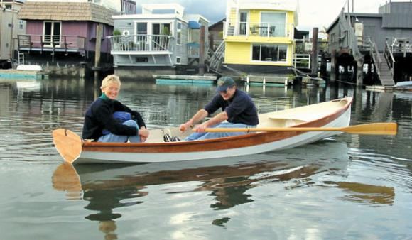 Two in a clinker rowing boat made from a kit