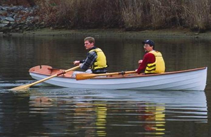 Two in a clinker rowing boat made at home