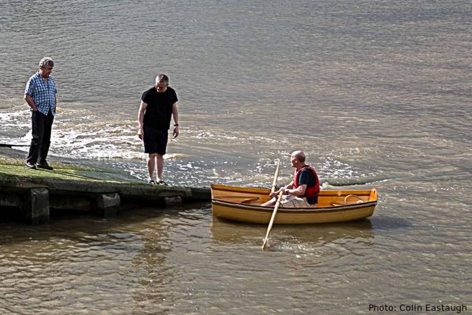 The Coot is a wooden rowing boat built using the cedar-strip method