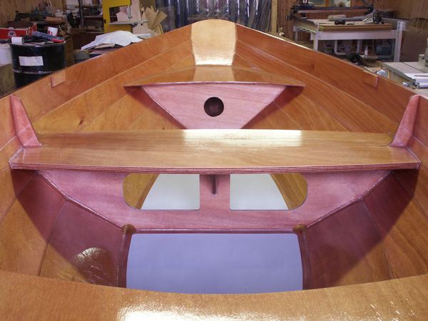 Wooden self built rowing dory for three people