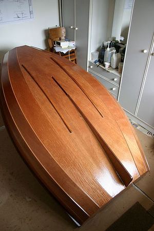 Rowing boat being built in a bedroom