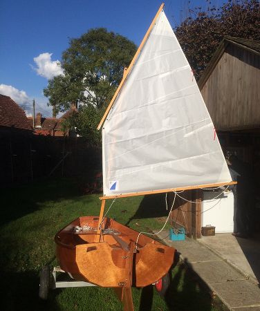 The Eastport Pram is a clinker-style wooden sailing and rowing dinghy