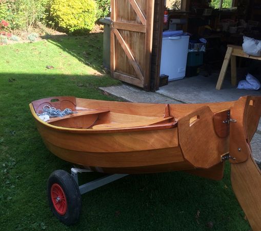 The Eastport Pram is a clinker-style wooden sailing and rowing dinghy