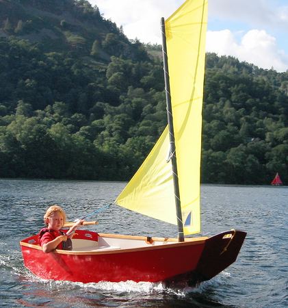 Learing to sail in a home made Elterwater pram